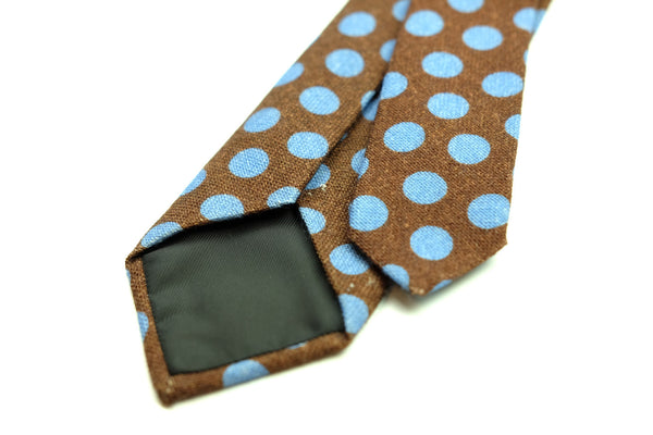 Brown with blue spots tie